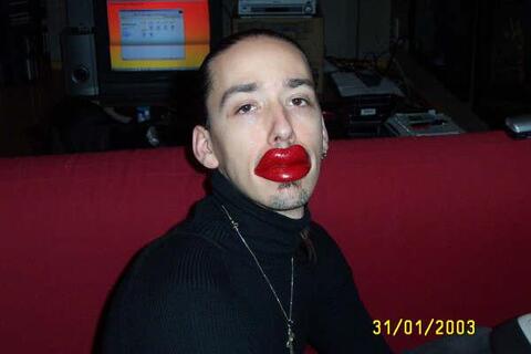 Armand at home, pre-testing the wax lips.