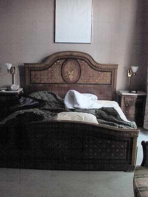 Al Capone's messy bed.